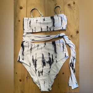 SHEIN Black & White one piece cut out swimsuit.   NWOT. Never worn. Size Large.